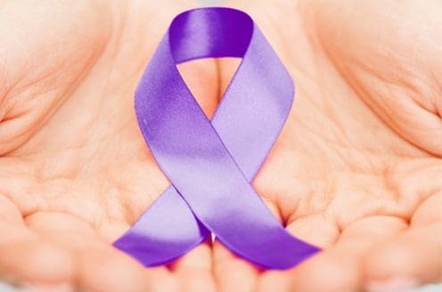 Imagem laço roxo na mão