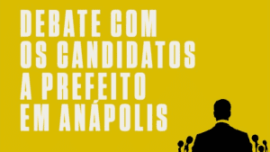 Fundo amarelo. Texto em branco diz "Debate com os candidatos a prefeito em Anápolis". O desenho de uma silhueta de homem falando ao público é vista no canto inferior direito.