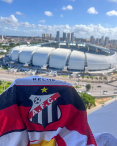 Imagem Arena das Dunas e camisa do Anápolis Futebol Clube