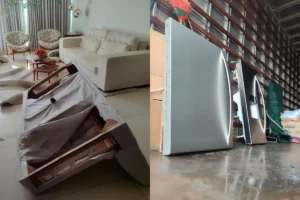 Imagem moveis revirados dentro de uma casa e outros dentro de um caminhão de mudança