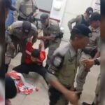 Imagem reprodução de vídeo homem sendo preso por policiais
