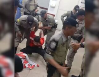 Imagem reprodução de vídeo homem sendo preso por policiais