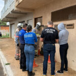 Imagem policiais e técnicos de energia