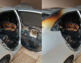 Imagem Carro branco incendiado