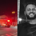 Imagem ambulância e carro de policia ao lado homem de camisa preta sorrindo