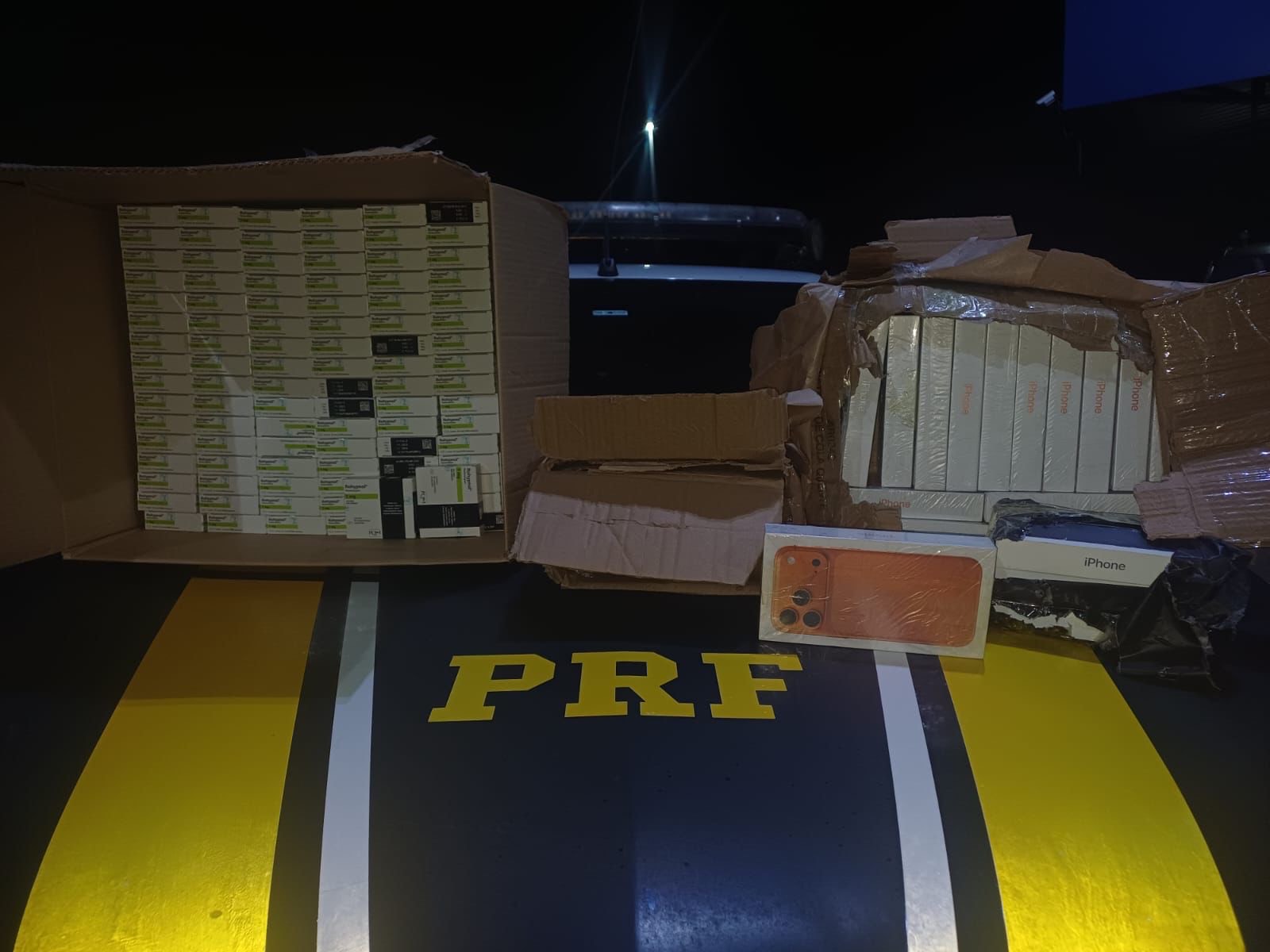 Imagem produtos presos pela PRF medicamentos e celulares