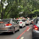 Imagem carros na rua no trânsito