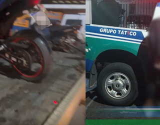 Imagem Moto e viatura da policia