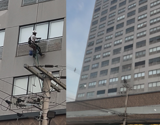 Imagem trabalhador suspense limpando prédio