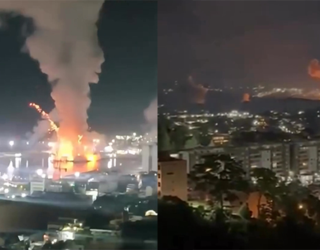 Imagem bombas e fogo em prédios de cidade