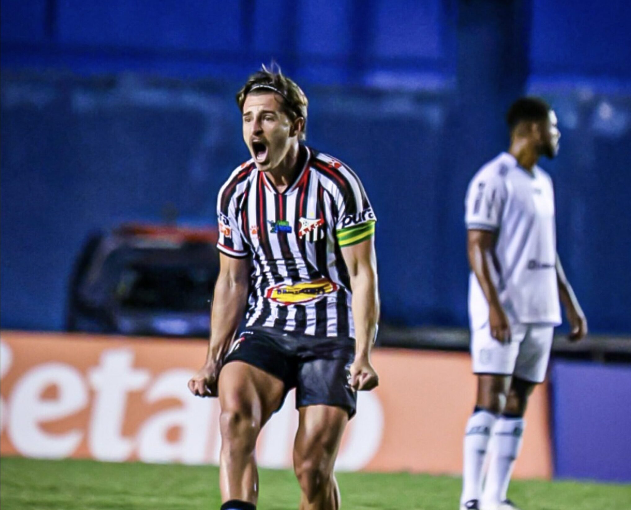 Imagem jogador comemorando