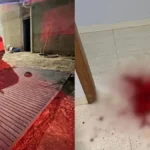 Imagem desfocada caro na garagem e poça de sangue